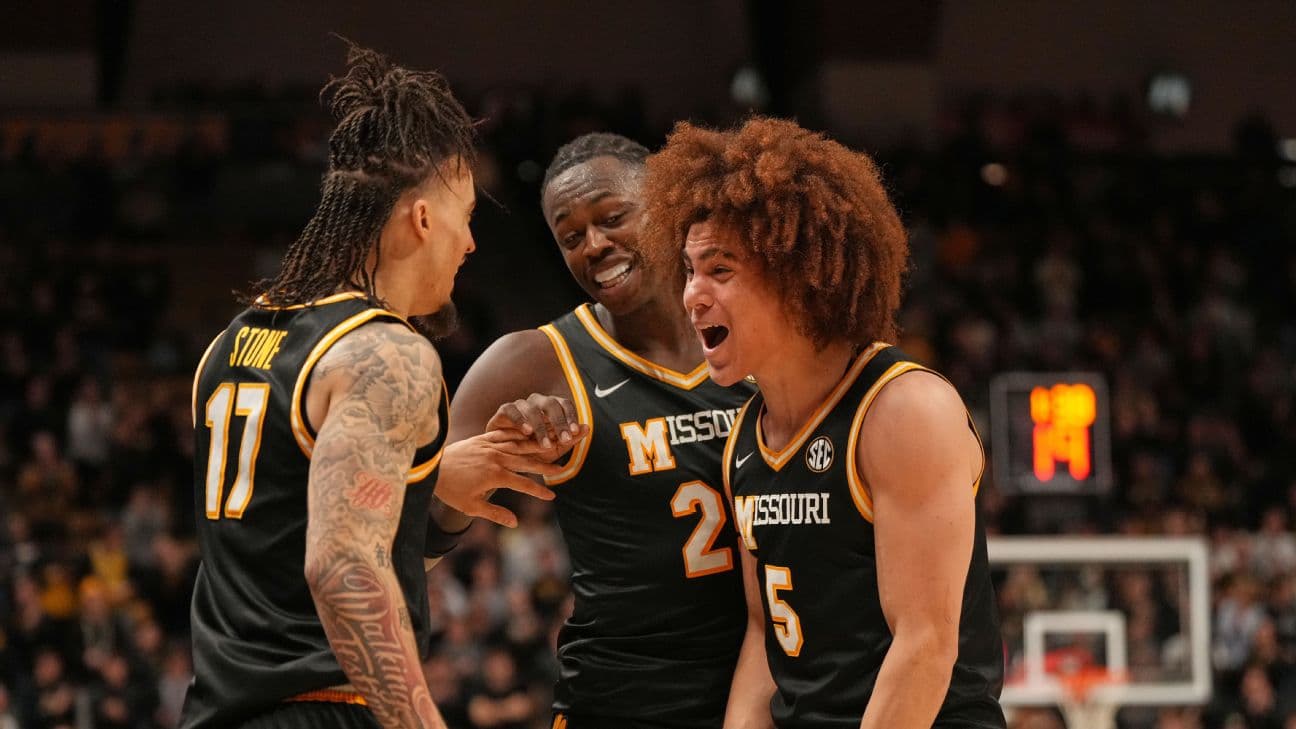 Missouri basketball players celebrating during a game